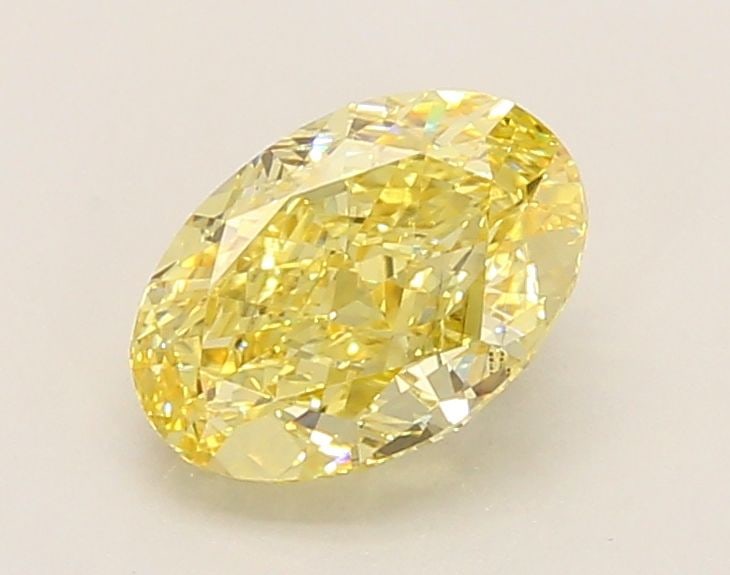Loose Diamond - OVAL 1.53ct Fancy Vivid Yellow VS2: Loose Diamond - OVAL 1.53ct Fancy Vivid Yellow VS2 Source: This is a real non-mined Diamond that has been grown in a lab Shape: OVAL Carats: 1.53 Color: Fancy Vivid Yellow Certification: IGI Video: