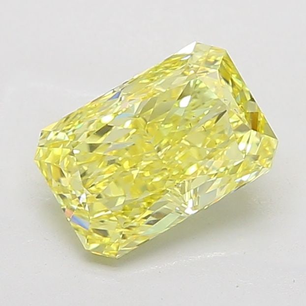 Loose Diamond - RADIANT 3.11ct Fancy Vivid Yellow VS2: Loose Diamond - RADIANT 3.11ct Fancy Vivid Yellow VS2 Source: This is a real non-mined Diamond that has been grown in a lab Shape: RADIANT Carats: 3.11 Color: Fancy Vivid Yellow Certification: IGI Vid