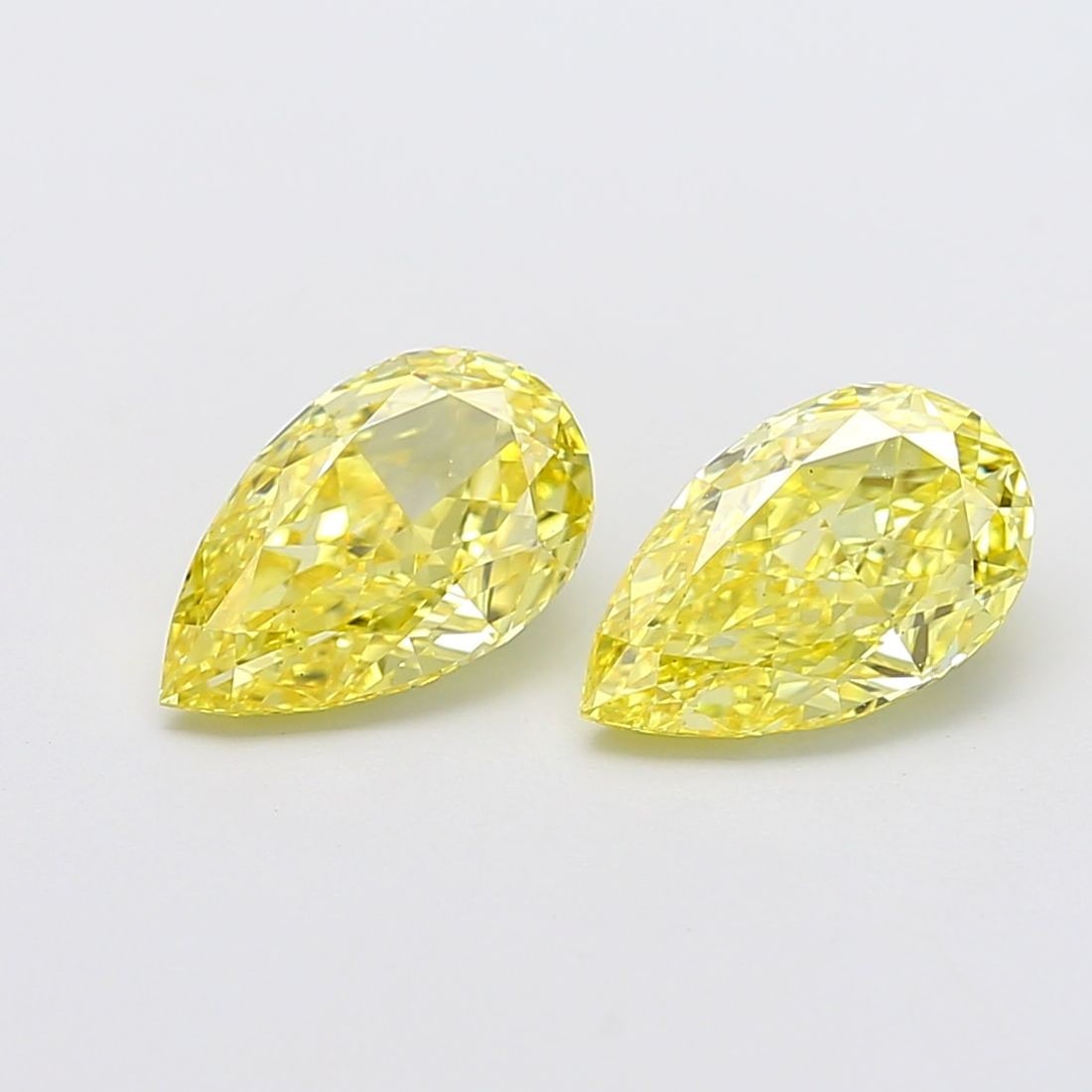 Loose Diamond - PEAR 2.03ct Fancy Intense Yellow VS1: Loose Diamond - PEAR 2.03ct Fancy Intense Yellow VS1 Source: This is a real non-mined Diamond that has been grown in a lab Shape: PEAR Carats: 2.03 Color: Fancy Intense Yellow Certification: IGI Video