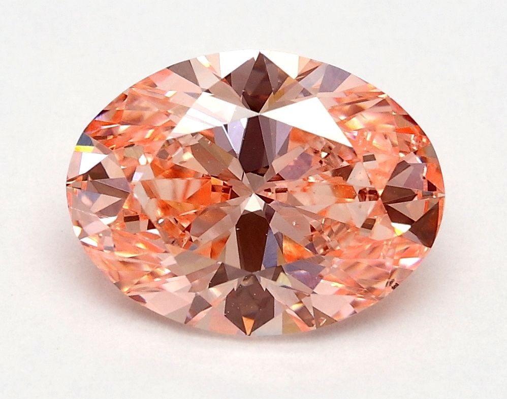 Loose Diamond - OVAL 1.7ct Fancy Vivid Pink SI2: Loose Diamond - OVAL 1.7ct Fancy Vivid Pink SI2 Source: This is a real non-mined Diamond that has been grown in a lab Shape: OVAL Carats: 1.7 Color: Fancy Vivid Pink Certification: IGI Video: