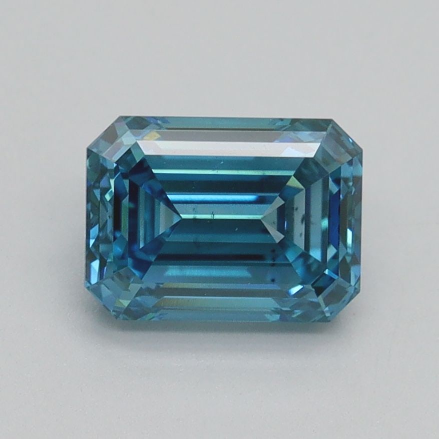 Loose Diamond - EMERALD 1.51ct Fancy Vivid Blue VS2: Loose Diamond - EMERALD 1.51ct Fancy Vivid Blue VS2 Source: This is a real non-mined Diamond that has been grown in a lab Shape: EMERALD Carats: 1.51 Color: Fancy Vivid Blue Certification: IGI Video: