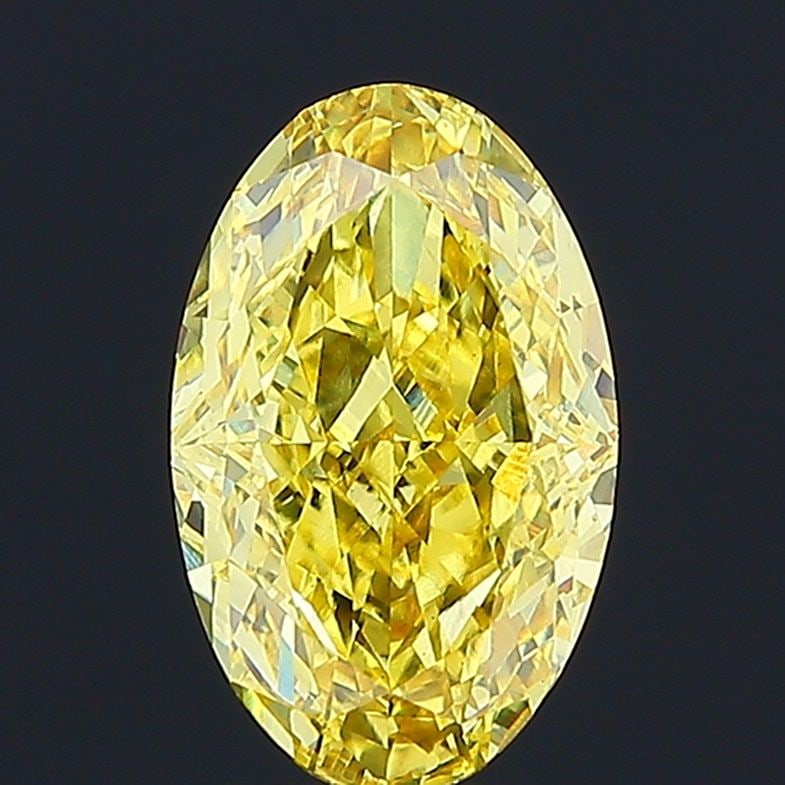Loose Diamond - OVAL 4.31ct Fancy Vivid Yellow VS1: Loose Diamond - OVAL 4.31ct Fancy Vivid Yellow VS1 Source: This is a real non-mined Diamond that has been grown in a lab Shape: OVAL Carats: 4.31 Color: Fancy Vivid Yellow Certification: IGI Video: