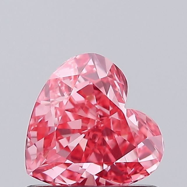 Loose Diamond - HEART 0.68ct Fancy Vivid Pink VS1: Loose Diamond - HEART 0.68ct Fancy Vivid Pink VS1 Source: This is a real non-mined Diamond that has been grown in a lab Shape: HEART Carats: 0.68 Color: Fancy Vivid Pink Certification: IGI Video: