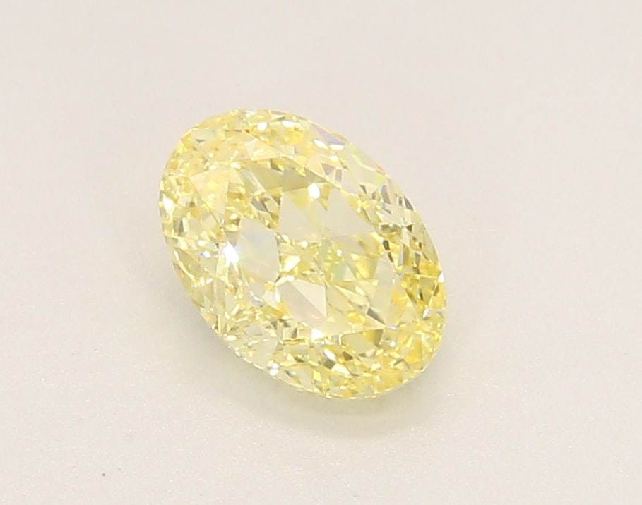 Loose Diamond - OVAL 1.04ct Fancy Yellow VS1: Loose Diamond - OVAL 1.04ct Fancy Yellow VS1 Source: This is a real non-mined Diamond that has been grown in a lab Shape: OVAL Carats: 1.04 Color: Fancy Yellow Certification: IGI Video: