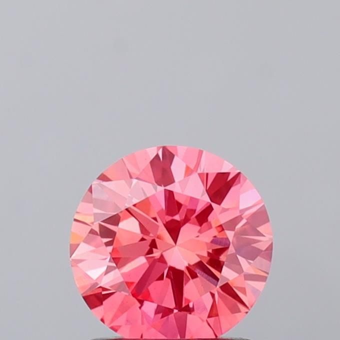 Loose Diamond - ROUND 1.04ct Fancy Vivid Pink VS1: Loose Diamond - ROUND 1.04ct Fancy Vivid Pink VS1 Source: This is a real non-mined Diamond that has been grown in a lab Shape: ROUND Carats: 1.04 Color: Fancy Vivid Pink Certification: IGI Video: