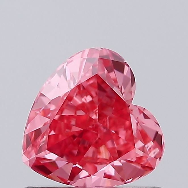 Loose Diamond - HEART 0.81ct Fancy Vivid Pink VS2: Loose Diamond - HEART 0.81ct Fancy Vivid Pink VS2 Source: This is a real non-mined Diamond that has been grown in a lab Shape: HEART Carats: 0.81 Color: Fancy Vivid Pink Certification: IGI Video: