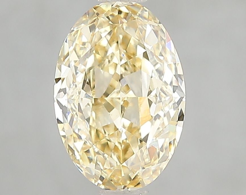 Loose Diamond - OVAL 2.1ct Fancy Intense Yellow VVS2: Loose Diamond - OVAL 2.1ct Fancy Intense Yellow VVS2 Source: This is a real non-mined Diamond that has been grown in a lab Shape: OVAL Carats: 2.1 Color: Fancy Intense Yellow Certification: IGI Video: