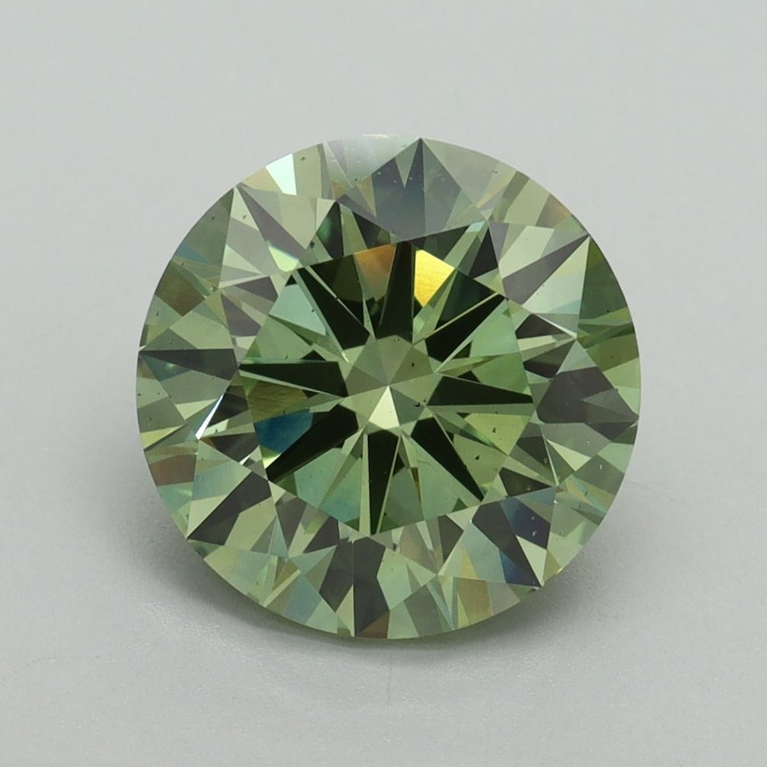 Ideal Loose Diamond - ROUND 3.58ct Fancy Vivid Green SI1: Ideal Loose Diamond - ROUND 3.58ct Fancy Vivid Green SI1 Source: This is a real non-mined Diamond that has been grown in a lab Shape: ROUND Carats: 3.58 Color: Fancy Vivid Green Certification: IGI Vid