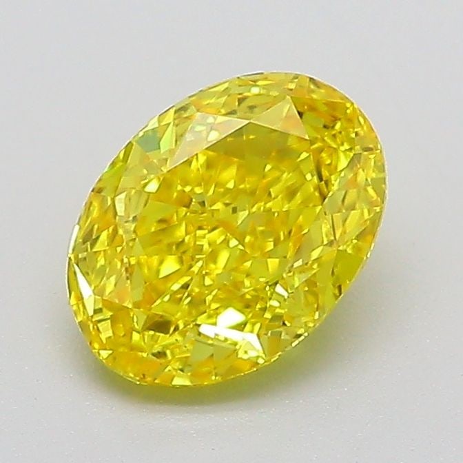 Loose Diamond - OVAL 1.06ct Fancy Vivid Yellow VVS2: Loose Diamond - OVAL 1.06ct Fancy Vivid Yellow VVS2 Source: This is a real non-mined Diamond that has been grown in a lab Shape: OVAL Carats: 1.06 Color: Fancy Vivid Yellow Certification: IGI The Diam