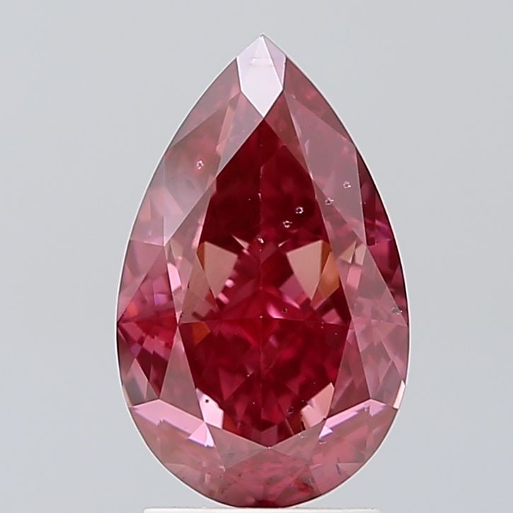 Loose Diamond - PEAR 3.06ct Fancy Vivid Pink SI1: Loose Diamond - PEAR 3.06ct Fancy Vivid Pink SI1 Source: This is a real non-mined Diamond that has been grown in a lab Shape: PEAR Carats: 3.06 Color: Fancy Vivid Pink Certification: IGI Video: