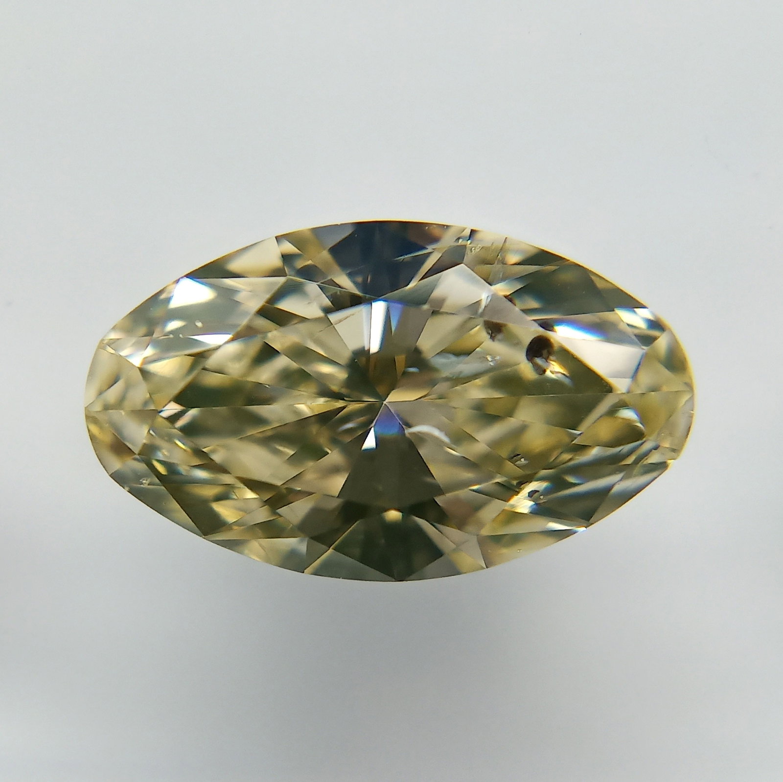Loose Diamond - OVAL 1.0ct Fancy Light Yellow: Loose Diamond - OVAL 1.0ct Fancy Light Yellow Source: Natural Shape: OVAL Carats: 1.0 Color: Fancy Light Yellow Certification: GIA The Diamond Depot Guarantee: All items in this auction are guaranteed