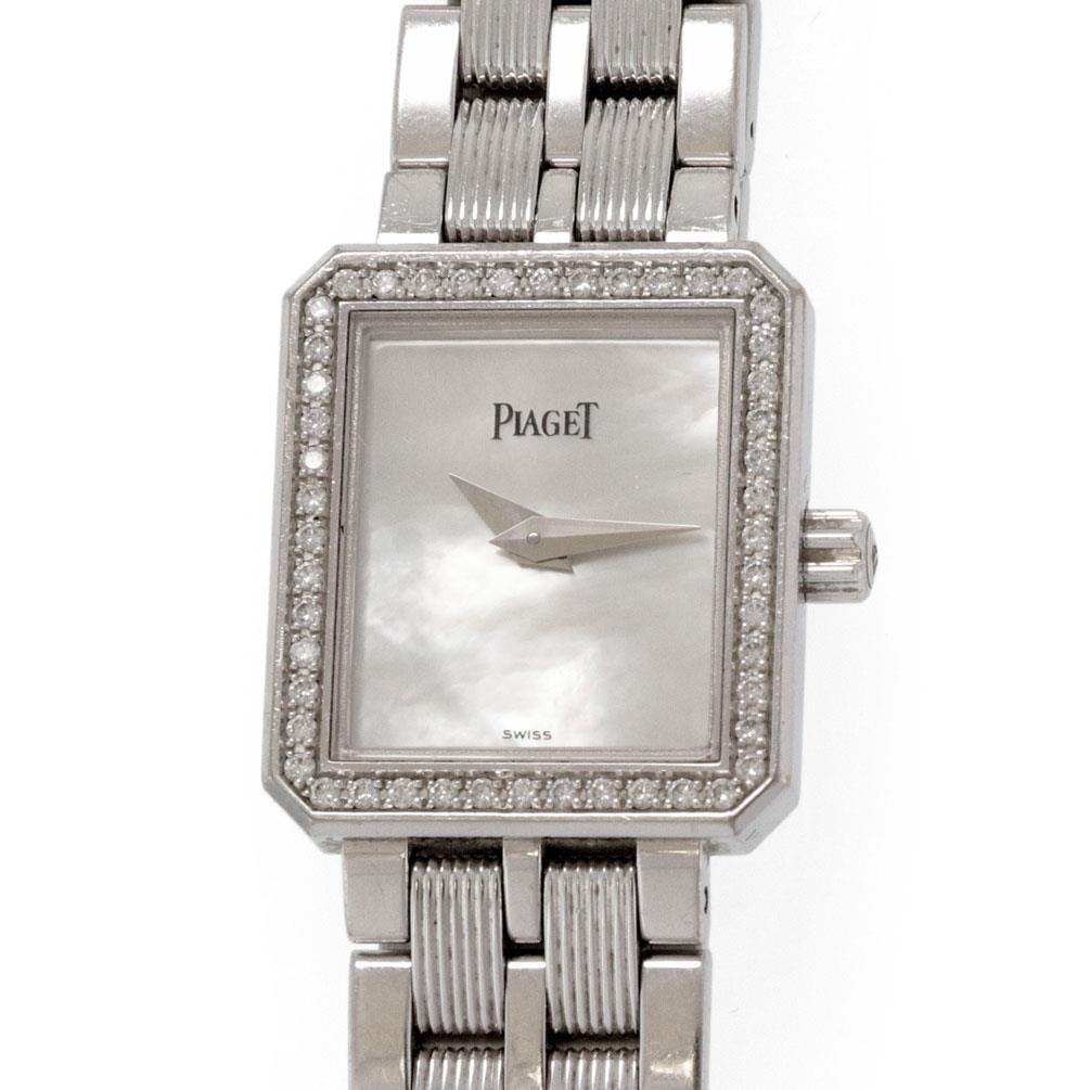 Piaget Protocole Ladies Watch 18k White Gold MOP Dial Diamond Bezel: Piaget Protocole Ladies Watch 18k White Gold MOP Dial Diamond Bezel Discover the elegance of this Piaget Protocole Diamond Bezel Ladies Watch, a stunning piece from the renowned Protocole Collection. 