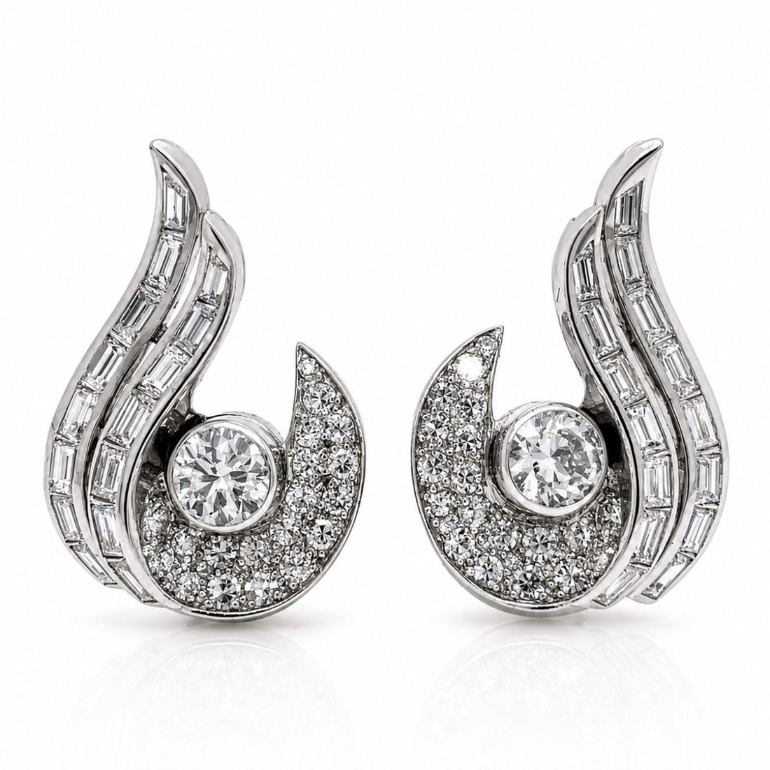 Platinum Art Deco Diamond Earrings 4.30 Ct European and Baguette Cut: Platinum Art Deco Diamond Earrings 4.30 Ct European and Baguette Cut Art Deco platinum diamond earrings featuring a total diamond weight of approximately 4.30 ct. The design is set with 2 European-cut