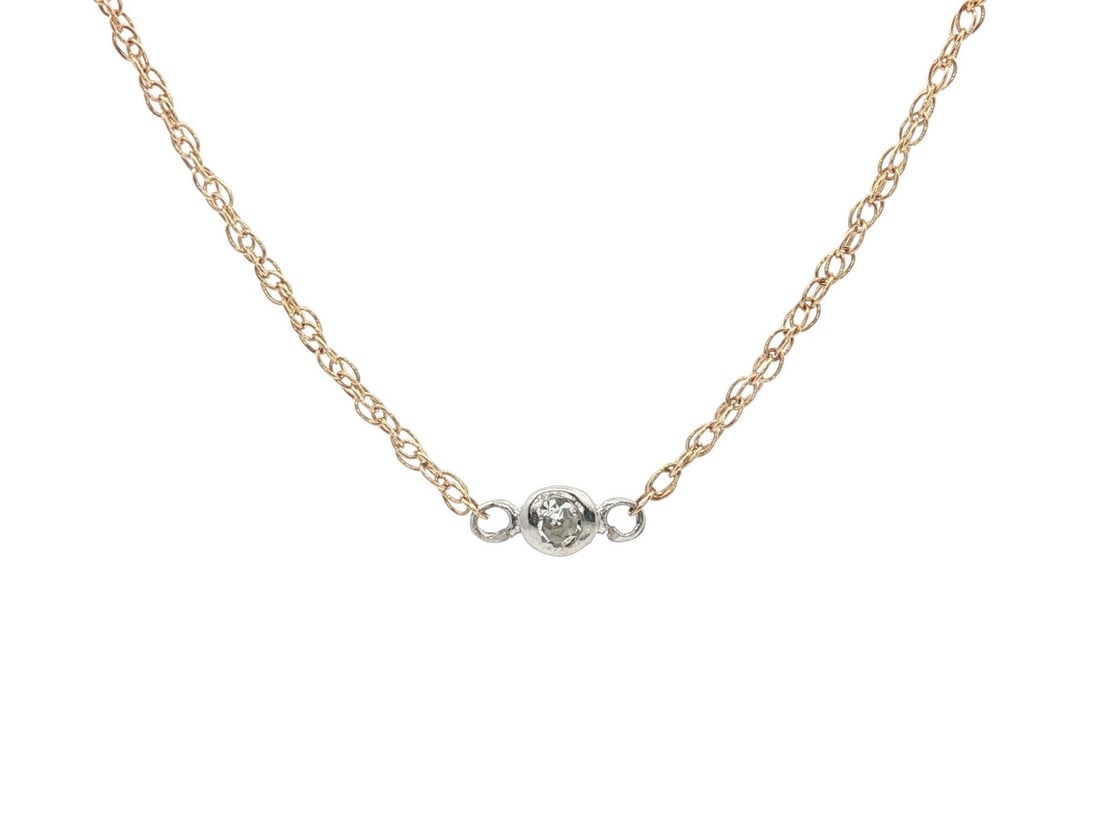 14k Yellow White Gold Diamond Pendant Necklace 15in: 14k Yellow White Gold Diamond Pendant Necklace 15in Delicate and understated, this pre-owned necklace features a single natural diamond in a bezel-set solitaire pendant suspended from a fine rope link