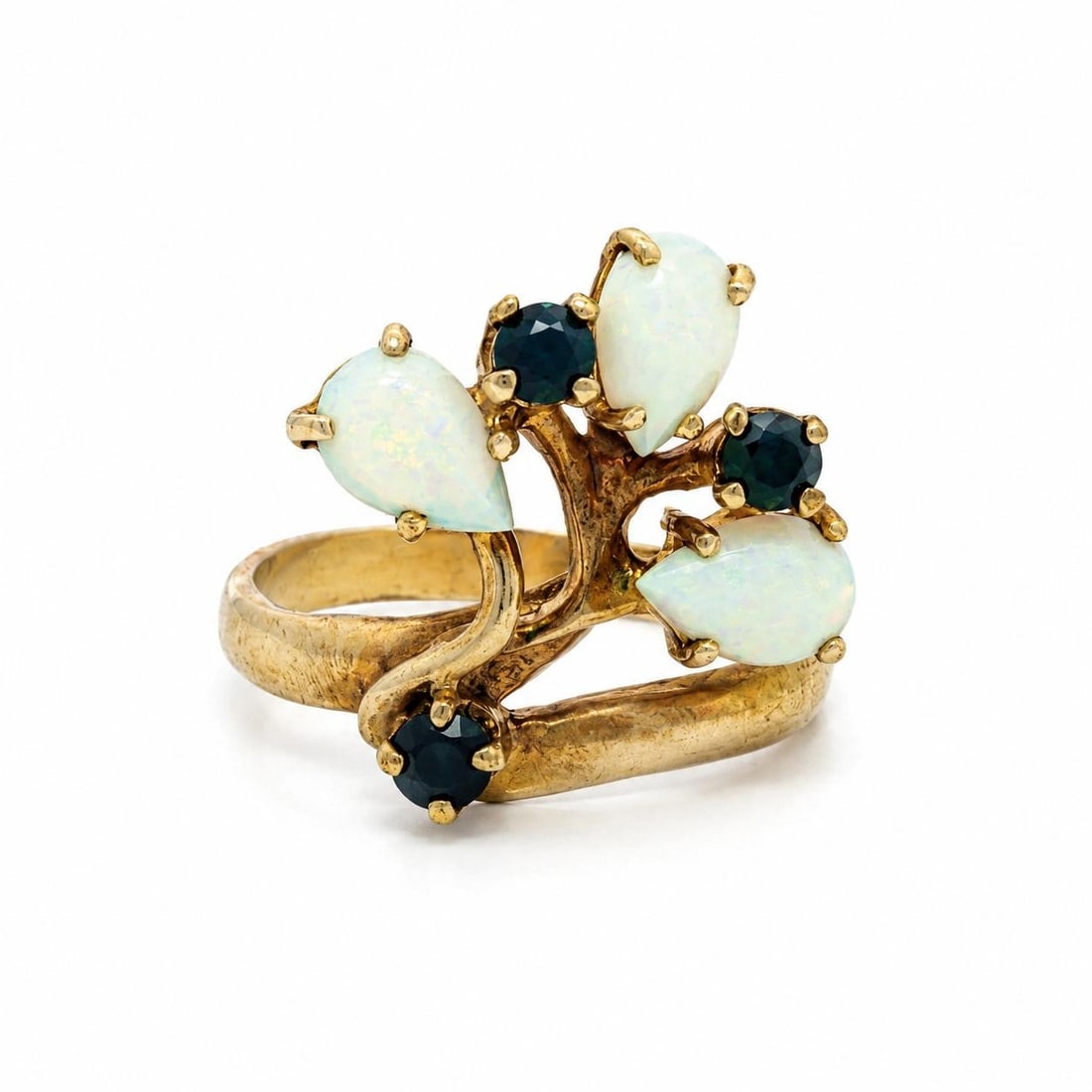 Vintage 10k Yellow Gold Cocktail Ring with Pear Opals and Round Sapphires: Vintage 10k Yellow Gold Cocktail Ring with Pear Opals and Round Sapphires Vintage cocktail ring featuring a pear-shaped opal and round sapphire spray design. This women's ring is crafted in solid yell