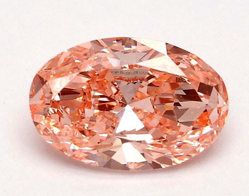 Loose Diamond - OVAL 1.01ct Fancy Vivid Pink VS2: Loose Diamond - OVAL 1.01ct Fancy Vivid Pink VS2 Source: This is a real non-mined Diamond that has been grown in a lab Shape: OVAL Carats: 1.01 Color: Fancy Vivid Pink Certification: IGI Video: