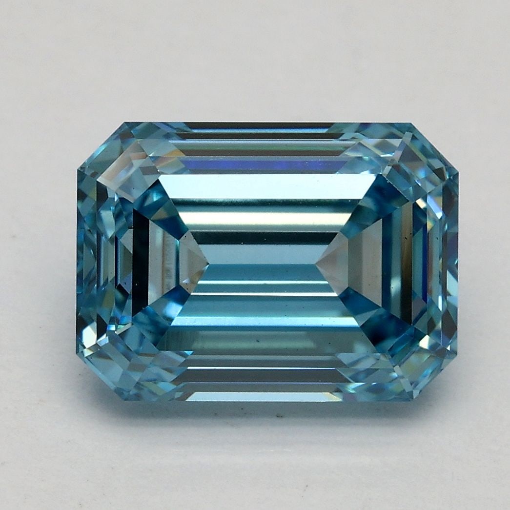 Loose Diamond - EMERALD 3.03ct Fancy Vivid Blue VS1: Loose Diamond - EMERALD 3.03ct Fancy Vivid Blue VS1 Source: This is a real non-mined Diamond that has been grown in a lab Shape: EMERALD Carats: 3.03 Color: Fancy Vivid Blue Certification: IGI Video: