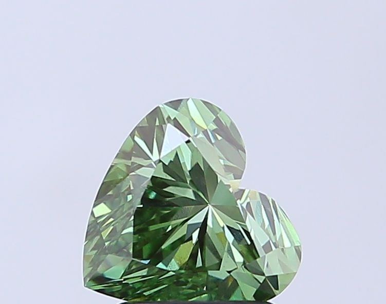 Loose Diamond - HEART 1.56ct Fancy Vivid Green VS1: Loose Diamond - HEART 1.56ct Fancy Vivid Green VS1 Source: This is a real non-mined Diamond that has been grown in a lab Shape: HEART Carats: 1.56 Color: Fancy Vivid Green Certification: IGI Video: