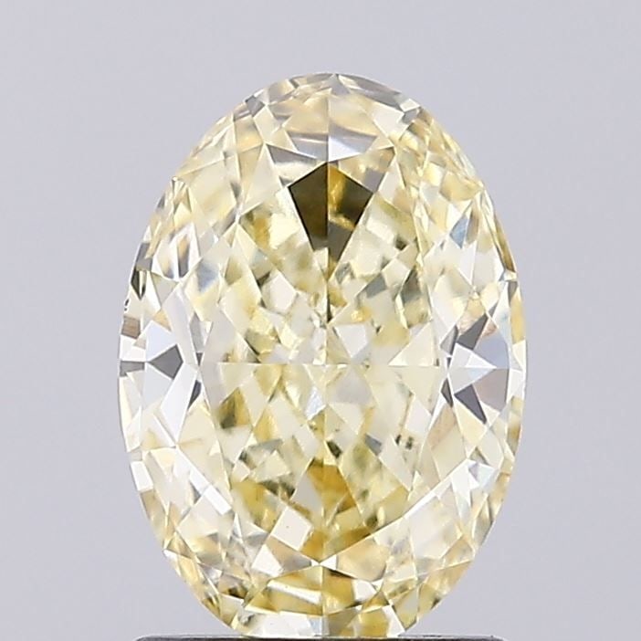 Loose Diamond - OVAL 1.52ct Fancy Yellow VVS2: Loose Diamond - OVAL 1.52ct Fancy Yellow VVS2 Source: This is a real non-mined Diamond that has been grown in a lab Shape: OVAL Carats: 1.52 Color: Fancy Yellow Certification: IGI Video:
