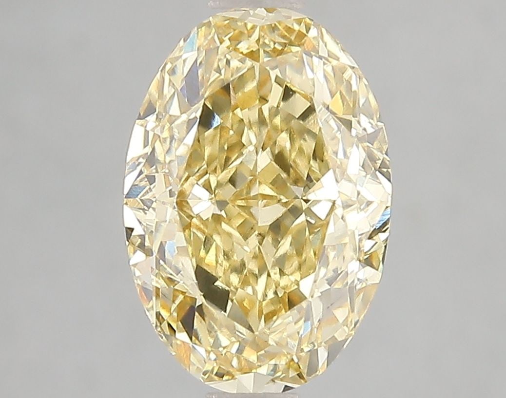 Loose Diamond - OVAL 3.01ct Fancy Intense Yellow VS2: Loose Diamond - OVAL 3.01ct Fancy Intense Yellow VS2 Source: This is a real non-mined Diamond that has been grown in a lab Shape: OVAL Carats: 3.01 Color: Fancy Intense Yellow Certification: IGI Video