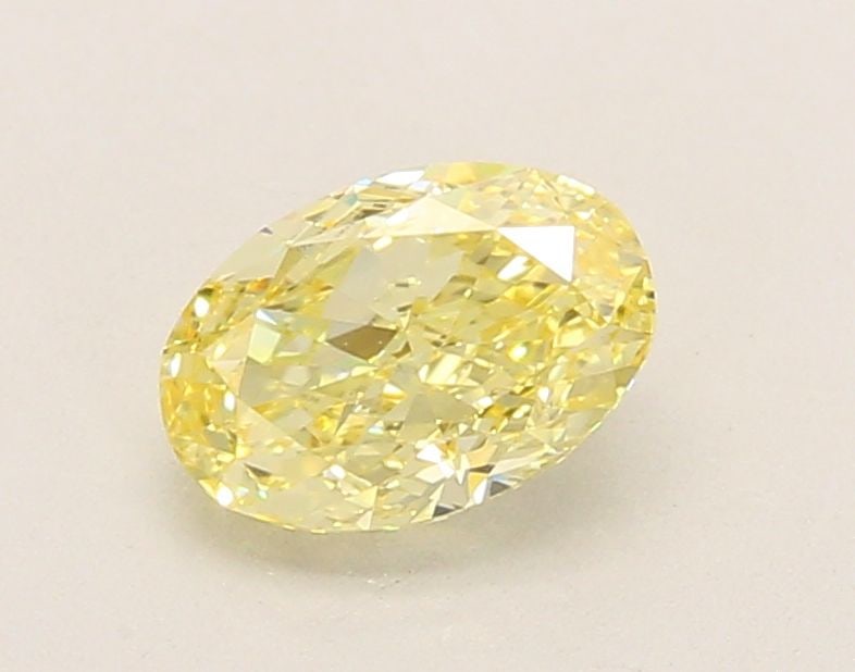 Loose Diamond - OVAL 1.08ct Fancy Yellow VVS2: Loose Diamond - OVAL 1.08ct Fancy Yellow VVS2 Source: This is a real non-mined Diamond that has been grown in a lab Shape: OVAL Carats: 1.08 Color: Fancy Yellow Certification: IGI Video: