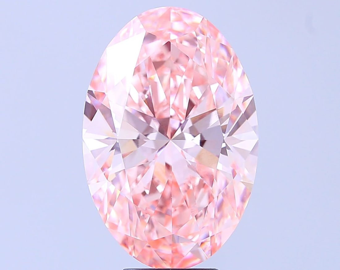 Loose Diamond - OVAL 7.7ct Fancy Vivid Pink VVS2: Loose Diamond - OVAL 7.7ct Fancy Vivid Pink VVS2 Source: This is a real non-mined Diamond that has been grown in a lab Shape: OVAL Carats: 7.7 Color: Fancy Vivid Pink Certification: IGI Video:
