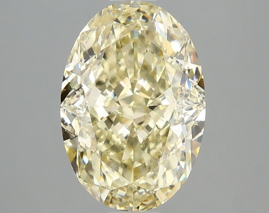 Loose Diamond - OVAL 3.05ct Fancy Yellow VS2: Loose Diamond - OVAL 3.05ct Fancy Yellow VS2 Source: This is a real non-mined Diamond that has been grown in a lab Shape: OVAL Carats: 3.05 Color: Fancy Yellow Certification: IGI Video: