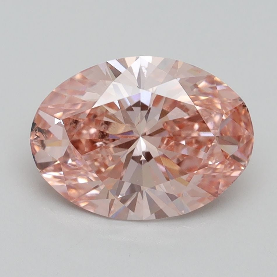Loose Diamond - OVAL 2.2ct Fancy Vivid Pink SI1: Loose Diamond - OVAL 2.2ct Fancy Vivid Pink SI1 Source: This is a real non-mined Diamond that has been grown in a lab Shape: OVAL Carats: 2.2 Color: Fancy Vivid Pink Certification: IGI Video: