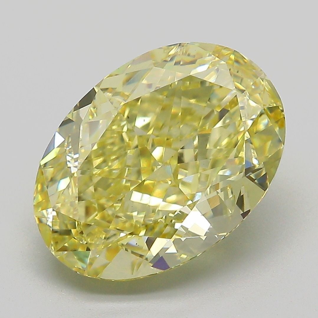 Loose Diamond - OVAL 6.06ct Fancy Yellow VS1: Loose Diamond - OVAL 6.06ct Fancy Yellow VS1 Source: This is a real non-mined Diamond that has been grown in a lab Shape: OVAL Carats: 6.06 Color: Fancy Yellow Certification: IGI Video:
