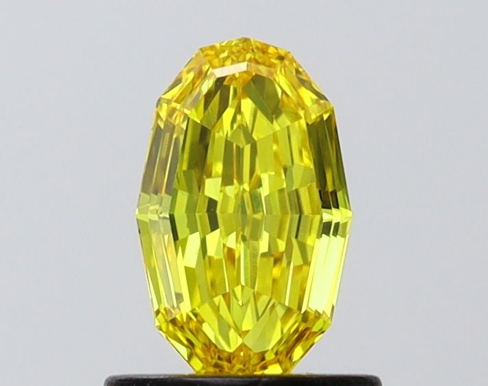 Loose Diamond - OVAL 0.76ct Fancy Vivid Yellow VVS1: Loose Diamond - OVAL 0.76ct Fancy Vivid Yellow VVS1 Source: This is a real non-mined Diamond that has been grown in a lab Shape: OVAL Carats: 0.76 Color: Fancy Vivid Yellow Certification: IGI Video: