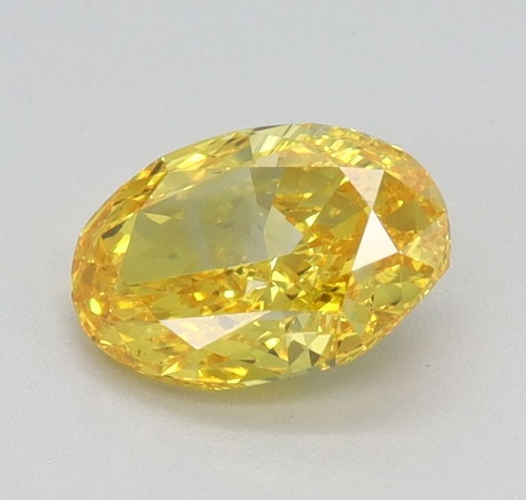 Loose Diamond - OVAL 0.59ct Fancy Vivid Yellow VS1: Loose Diamond - OVAL 0.59ct Fancy Vivid Yellow VS1 Source: This is a real non-mined Diamond that has been grown in a lab Shape: OVAL Carats: 0.59 Color: Fancy Vivid Yellow Certification: IGI Video: