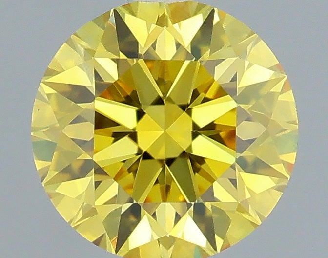 Loose Diamond - ROUND 0.61ct Fancy Vivid Yellow VVS2: Loose Diamond - ROUND 0.61ct Fancy Vivid Yellow VVS2 Source: This is a real non-mined Diamond that has been grown in a lab Shape: ROUND Carats: 0.61 Color: Fancy Vivid Yellow Certification: IGI Video: