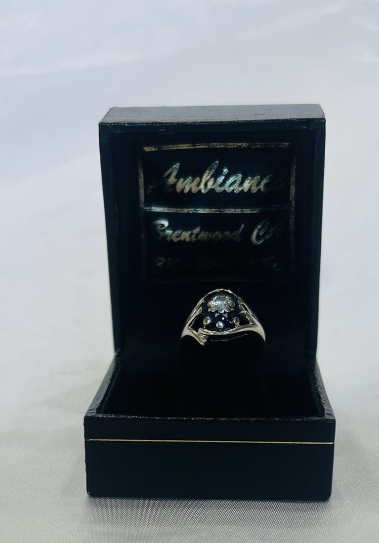 14k White Gold Ring with Sapphire and Diamond Size 3.75: 14k White Gold Ring with Sapphire and Diamond Size 3.75 Pre-owned 14k white gold ring featuring sapphire and diamond accents. This unbranded piece has a detailed design and polished finish. Specificat