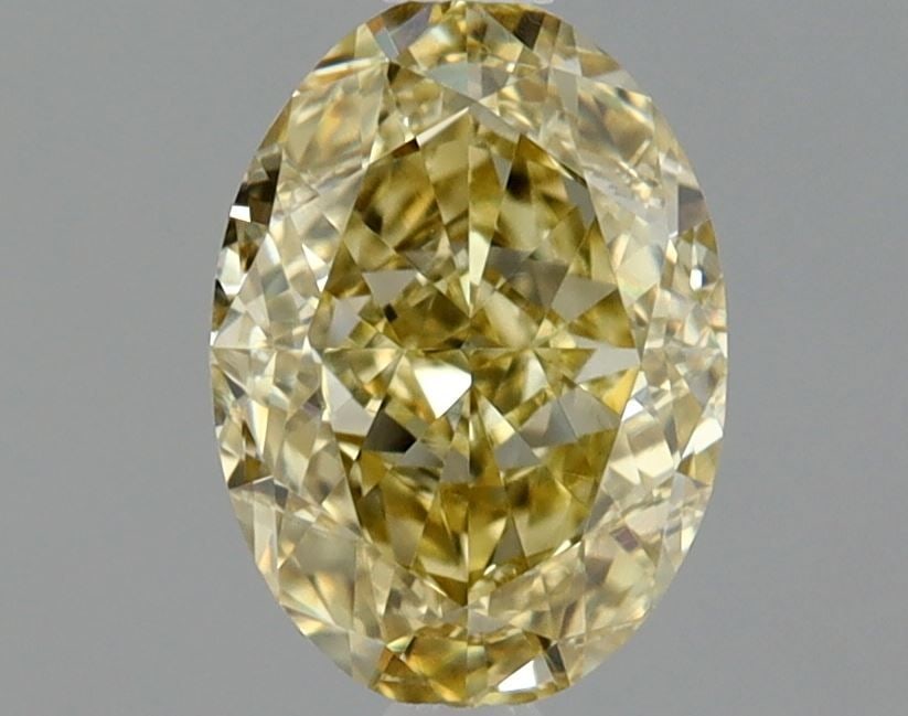 Loose Diamond - OVAL 0.73ct Fancy Yellow Brown VVS2: Loose Diamond - OVAL 0.73ct Fancy Yellow Brown VVS2 Source: Natural Shape: OVAL Carats: 0.73 Color: Fancy Yellow Brown Certification: GIA Video: