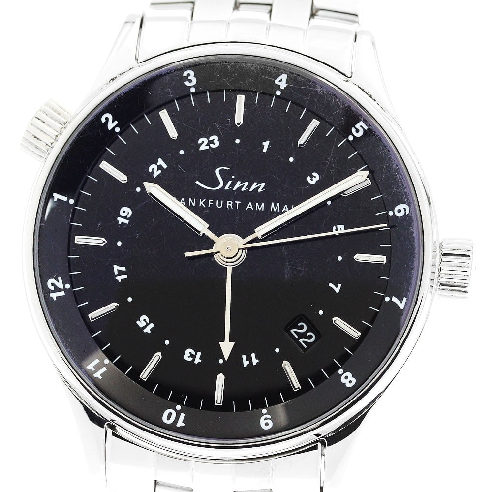 Sinn Financial 6060 automatic dual time date mens wristwatch: Sinn Financial 6060 automatic dual time date mens wristwatch Sinn 6060 Financial WatchDate dual time automatic men's wristwatch with a black dial and stainless steel case and bracelet. This German-mad