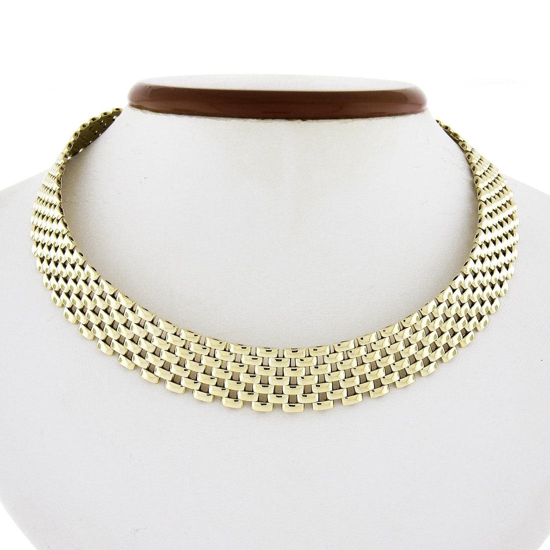 16 Inch 14K Yellow Gold Seven Row Flat Panther Chain Choker Necklace Italian: 16 Inch 14K Yellow Gold Seven Row Flat Panther Chain Choker Necklace Italian This Italian 14K yellow gold choker necklace features a 16-inch flat panther link chain with 7 rows. Crafted from solid 14K