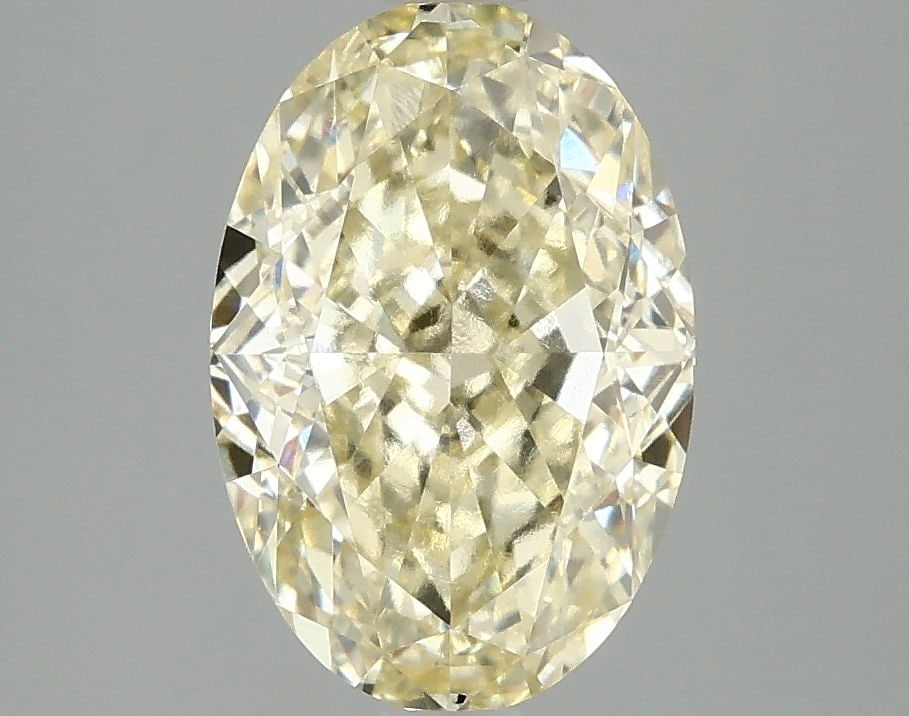 Loose Diamond - OVAL 3.08ct Fancy Vivid Yellow VS2: Loose Diamond - OVAL 3.08ct Fancy Vivid Yellow VS2 Source: This is a real non-mined Diamond that has been grown in a lab Shape: OVAL Carats: 3.08 Color: Fancy Vivid Yellow Certification: IGI Video: