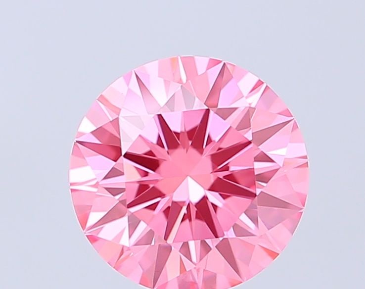 Ideal Loose Diamond - ROUND 1.09ct Fancy Vivid Pink VVS2: Ideal Loose Diamond - ROUND 1.09ct Fancy Vivid Pink VVS2 Source: This is a real non-mined Diamond that has been grown in a lab Shape: ROUND Carats: 1.09 Color: Fancy Vivid Pink Certification: IGI Vide