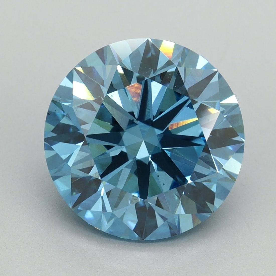 Loose Diamond - ROUND 5.02ct Fancy Vivid Blue VS2: Loose Diamond - ROUND 5.02ct Fancy Vivid Blue VS2 Source: This is a real non-mined Diamond that has been grown in a lab Shape: ROUND Carats: 5.02 Color: Fancy Vivid Blue Certification: IGI Video: