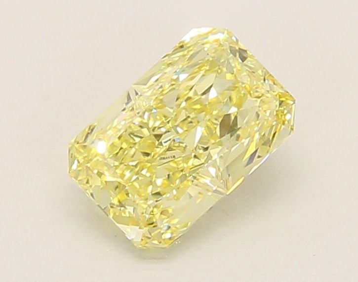 Loose Diamond - RADIANT 1.26ct Fancy Yellow VVS2: Loose Diamond - RADIANT 1.26ct Fancy Yellow VVS2 Source: This is a real non-mined Diamond that has been grown in a lab Shape: RADIANT Carats: 1.26 Color: Fancy Yellow Certification: IGI Video: