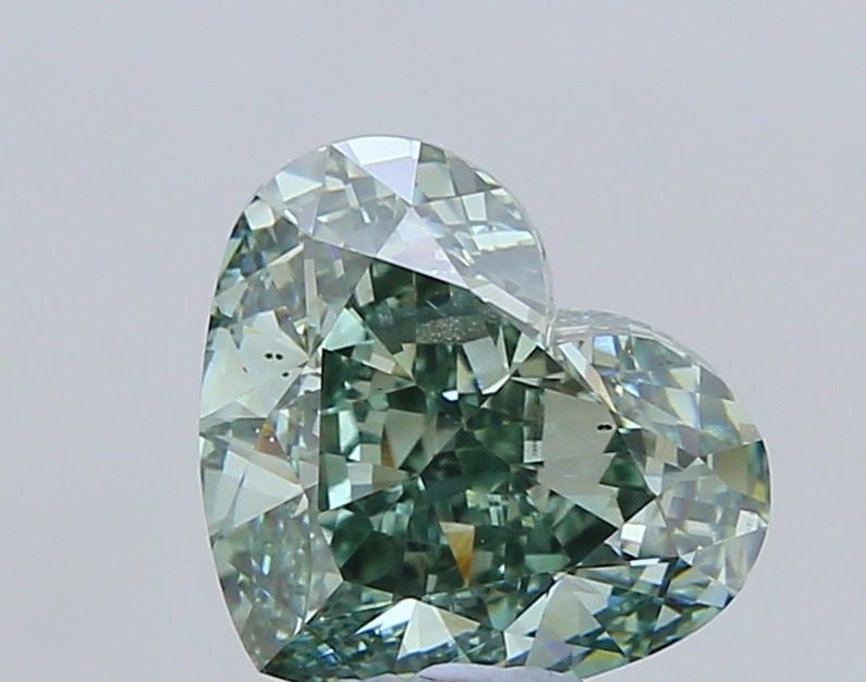 Loose Diamond - HEART 5.07ct Fancy Vivid Green VS2: Loose Diamond - HEART 5.07ct Fancy Vivid Green VS2 Source: This is a real non-mined Diamond that has been grown in a lab Shape: HEART Carats: 5.07 Color: Fancy Vivid Green Certification: IGI Video: