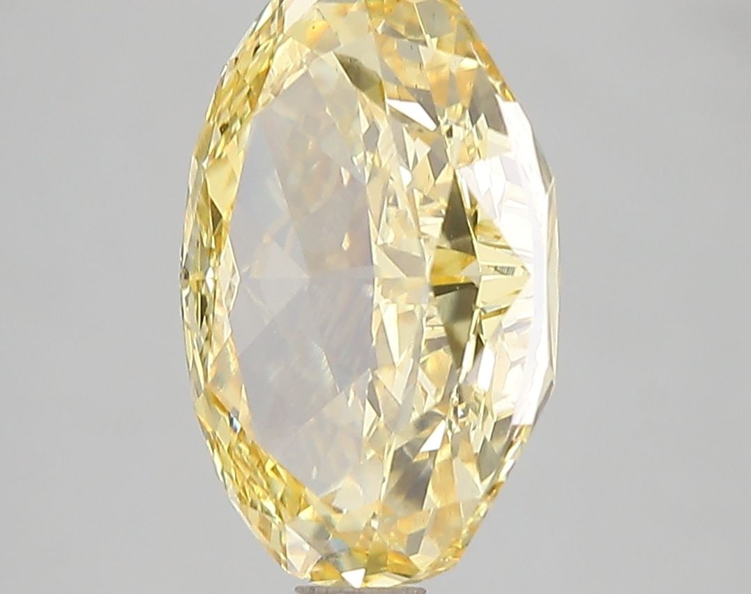Loose Diamond - OVAL 4.6ct Fancy Vivid Yellow VS1: Loose Diamond - OVAL 4.6ct Fancy Vivid Yellow VS1 Source: This is a real non-mined Diamond that has been grown in a lab Shape: OVAL Carats: 4.6 Color: Fancy Vivid Yellow Certification: IGI Video: