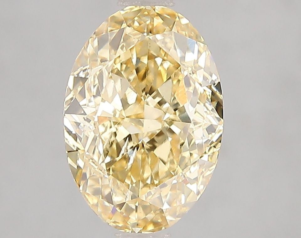 Loose Diamond - OVAL 3.04ct Fancy Intense Yellow VS2: Loose Diamond - OVAL 3.04ct Fancy Intense Yellow VS2 Source: This is a real non-mined Diamond that has been grown in a lab Shape: OVAL Carats: 3.04 Color: Fancy Intense Yellow Certification: IGI
