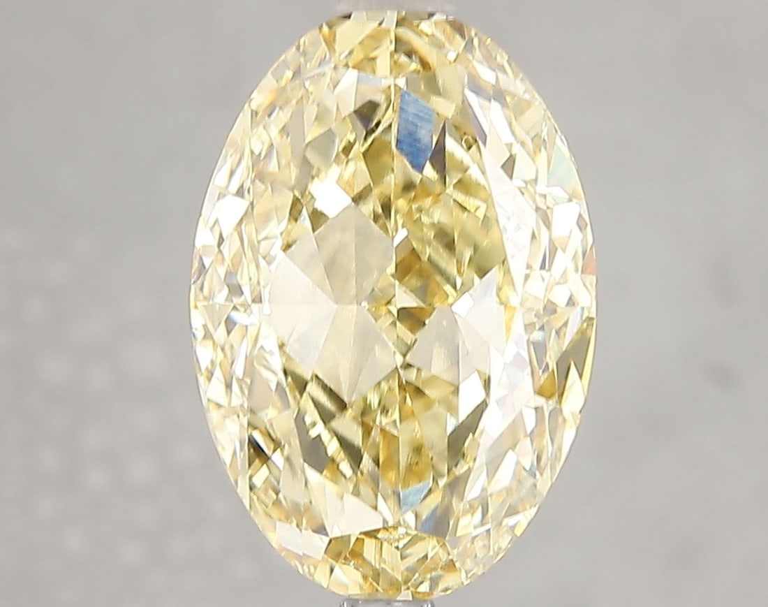 Loose Diamond - OVAL 5.01ct Fancy Intense Yellow VS2: Loose Diamond - OVAL 5.01ct Fancy Intense Yellow VS2 Source: This is a real non-mined Diamond that has been grown in a lab Shape: OVAL Carats: 5.01 Color: Fancy Intense Yellow Certification: IGI