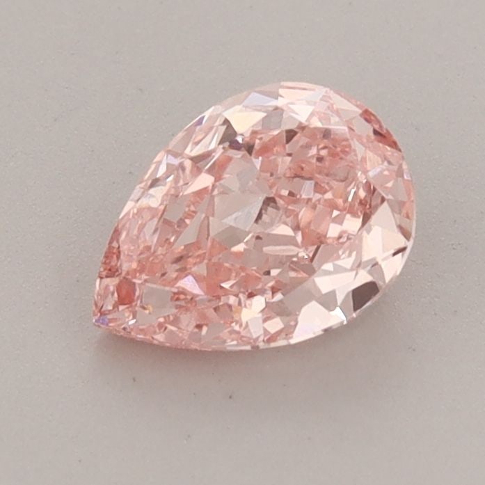 Loose Diamond - PEAR 0.81ct Fancy Vivid Pink VVS2: Loose Diamond - PEAR 0.81ct Fancy Vivid Pink VVS2 Source: This is a real non-mined Diamond that has been grown in a lab Shape: PEAR Carats: 0.81 Color: Fancy Vivid Pink Certification: IGI Video: