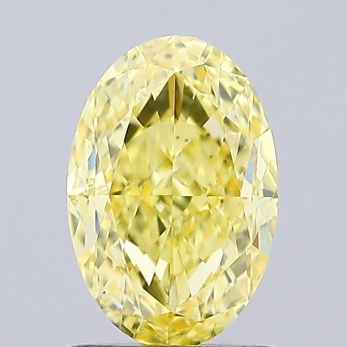 Loose Diamond - OVAL 1.3ct Fancy Intense Yellow VS1: Loose Diamond - OVAL 1.3ct Fancy Intense Yellow VS1 Source: This is a real non-mined Diamond that has been grown in a lab Shape: OVAL Carats: 1.3 Color: Fancy Intense Yellow Certification: IGI Video: