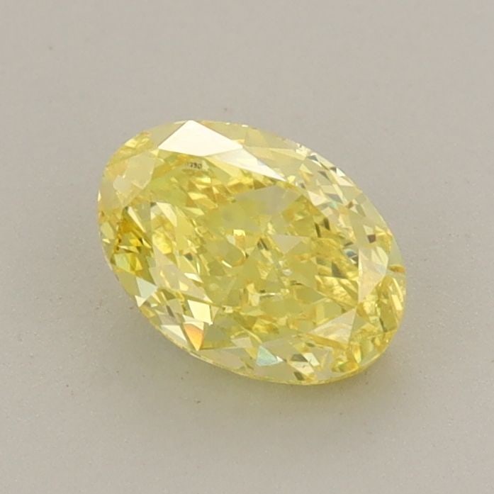 Loose Diamond - OVAL 0.71ct Fancy Vivid Yellow VS1: Loose Diamond - OVAL 0.71ct Fancy Vivid Yellow VS1 Source: This is a real non-mined Diamond that has been grown in a lab Shape: OVAL Carats: 0.71 Color: Fancy Vivid Yellow Certification: IGI Video: