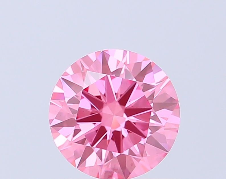 Loose Diamond - ROUND 1.0ct Fancy Vivid Pink VS2: Loose Diamond - ROUND 1.0ct Fancy Vivid Pink VS2 Source: This is a real non-mined Diamond that has been grown in a lab Shape: ROUND Carats: 1.0 Color: Fancy Vivid Pink Certification: IGI The Diamond D