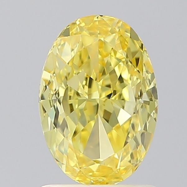 Loose Diamond - OVAL 1.51ct Fancy Vivid Yellow VS1: Loose Diamond - OVAL 1.51ct Fancy Vivid Yellow VS1 Source: This is a real non-mined Diamond that has been grown in a lab Shape: OVAL Carats: 1.51 Color: Fancy Vivid Yellow Certification: IGI Video: