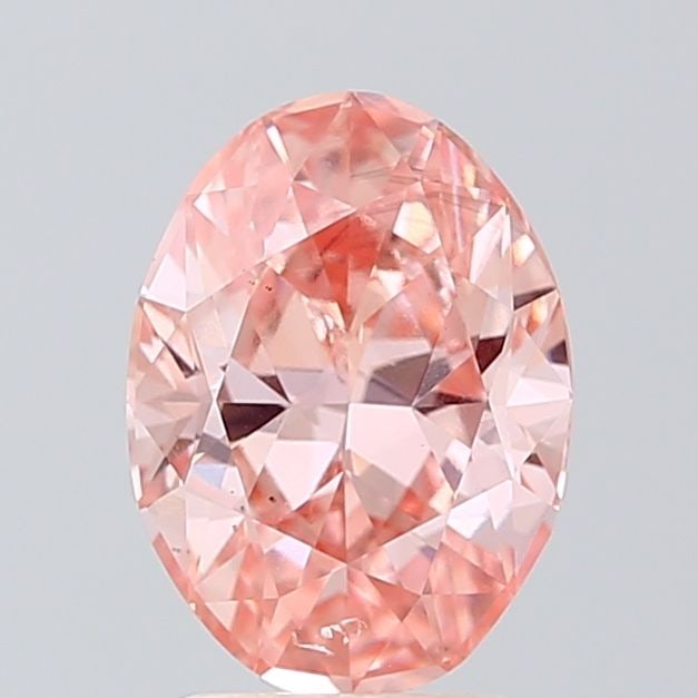 Loose Diamond - OVAL 2.0ct Fancy Vivid Pink VVS2: Loose Diamond - OVAL 2.0ct Fancy Vivid Pink VVS2 Source: This is a real non-mined Diamond that has been grown in a lab Shape: OVAL Carats: 2.0 Color: Fancy Vivid Pink Certification: IGI Video: